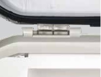 Hinged polycarbonate lens for easy maintenance