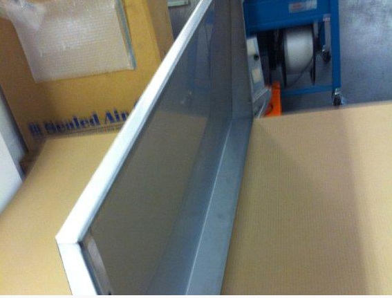 A weather canopy - allows free movement of air through the large panel without water ingress