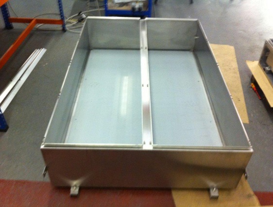 The large panel with double access doors and mounting plate