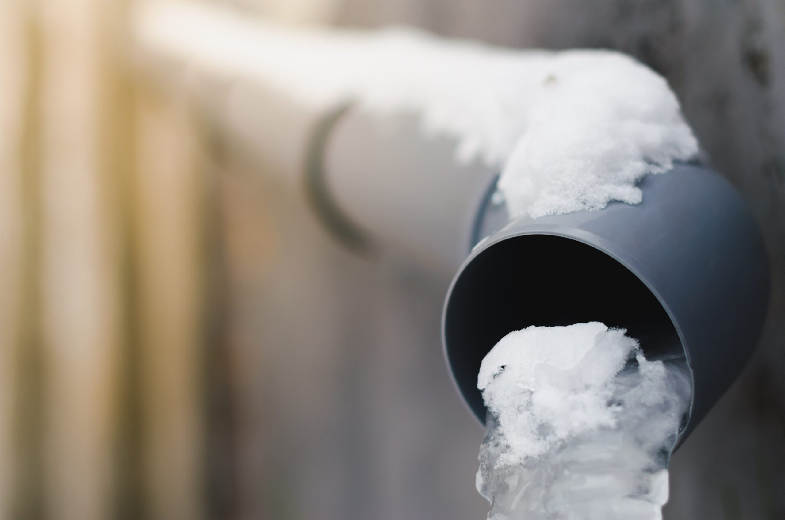 Frozen Rain Water Requires Gutter Heating System