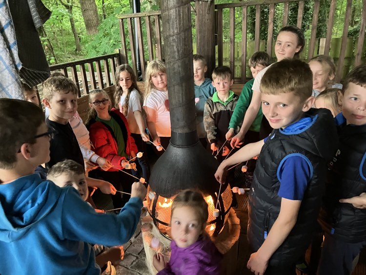 Kids around fire
